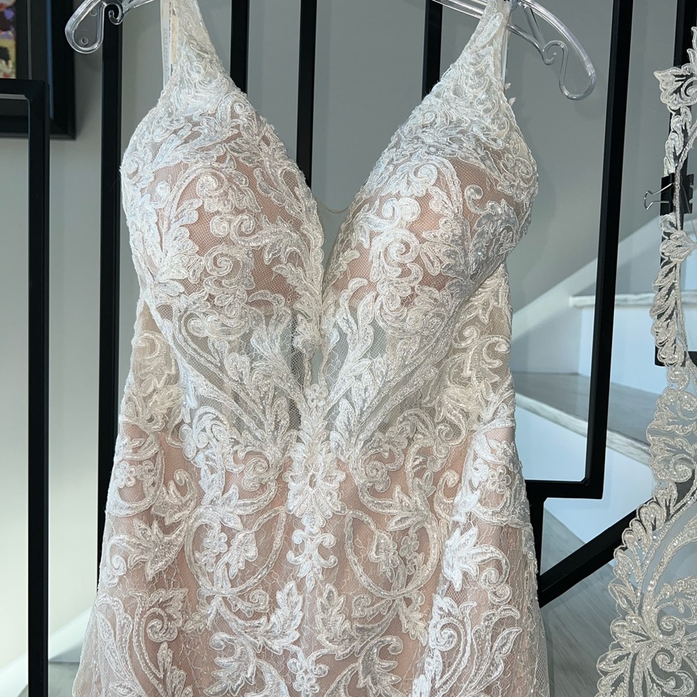 Never used/worn/altered Martina Liana wedding dress size 10.
